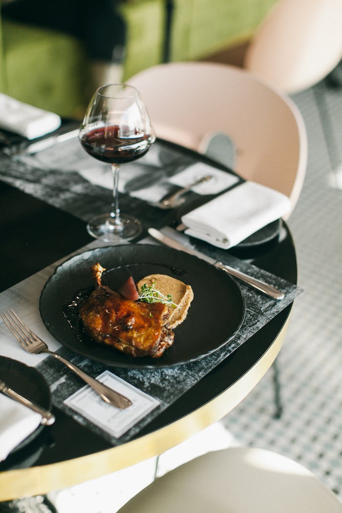 Cooked Food on Round Black Plate