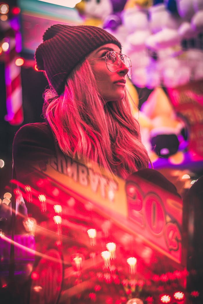 Shallow Focus Photo of Woman Wearing Black Knit Cap and Eyeglasses